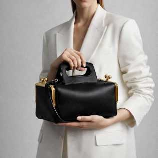 High-quality retro side clamp design fashion light luxury women's handbag